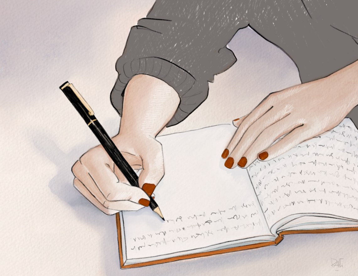 Carnet ouvert utilisé comme journal intime avec un stylo posé à côté